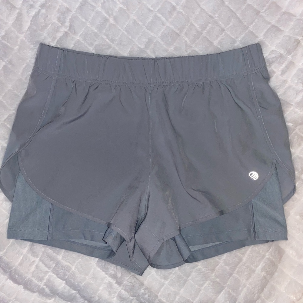 Gray athletic running shorts with built in spandex.